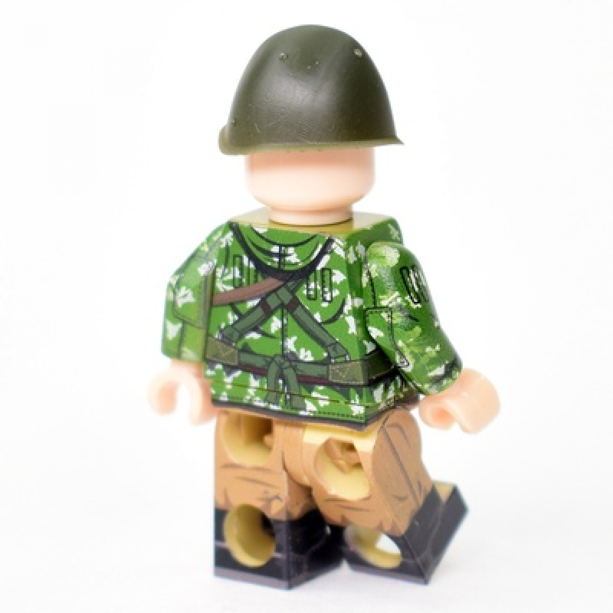 Airborne soldier in KLMK jacket, a birch split in a helmet