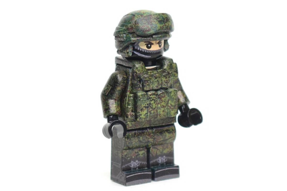 Modern Russian Soldier in summer field uniform with body armor and helmet