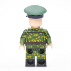 Borderguard in birch camouflage, wearing a cap